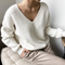 Maglione a trecce chunky con scollo a V